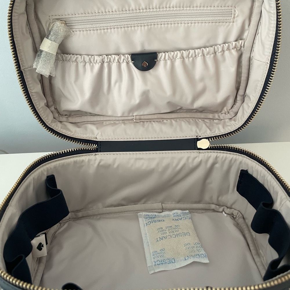 Kate spade cosmetic bag in “spade flower jacquard” blue & navy